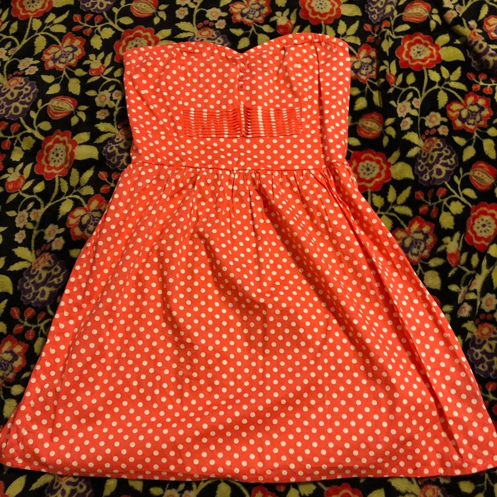 Sleeveless pink polka dot dress
